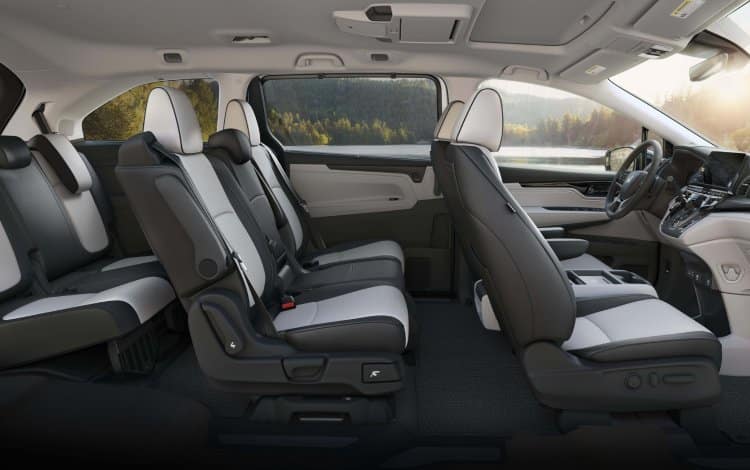 2026 Honda Odyssey Elite view of interior cabin showcasing all three rows and seating capacity.
